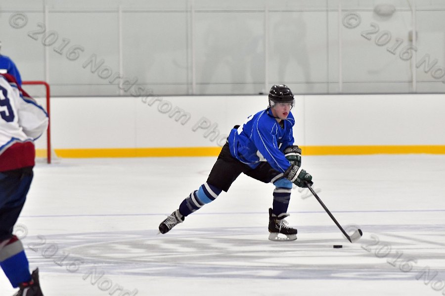 Wheaton College Men\'s Ice Hockey vs Middlesex Community College. - Photo By: KEITH NORDSTROM